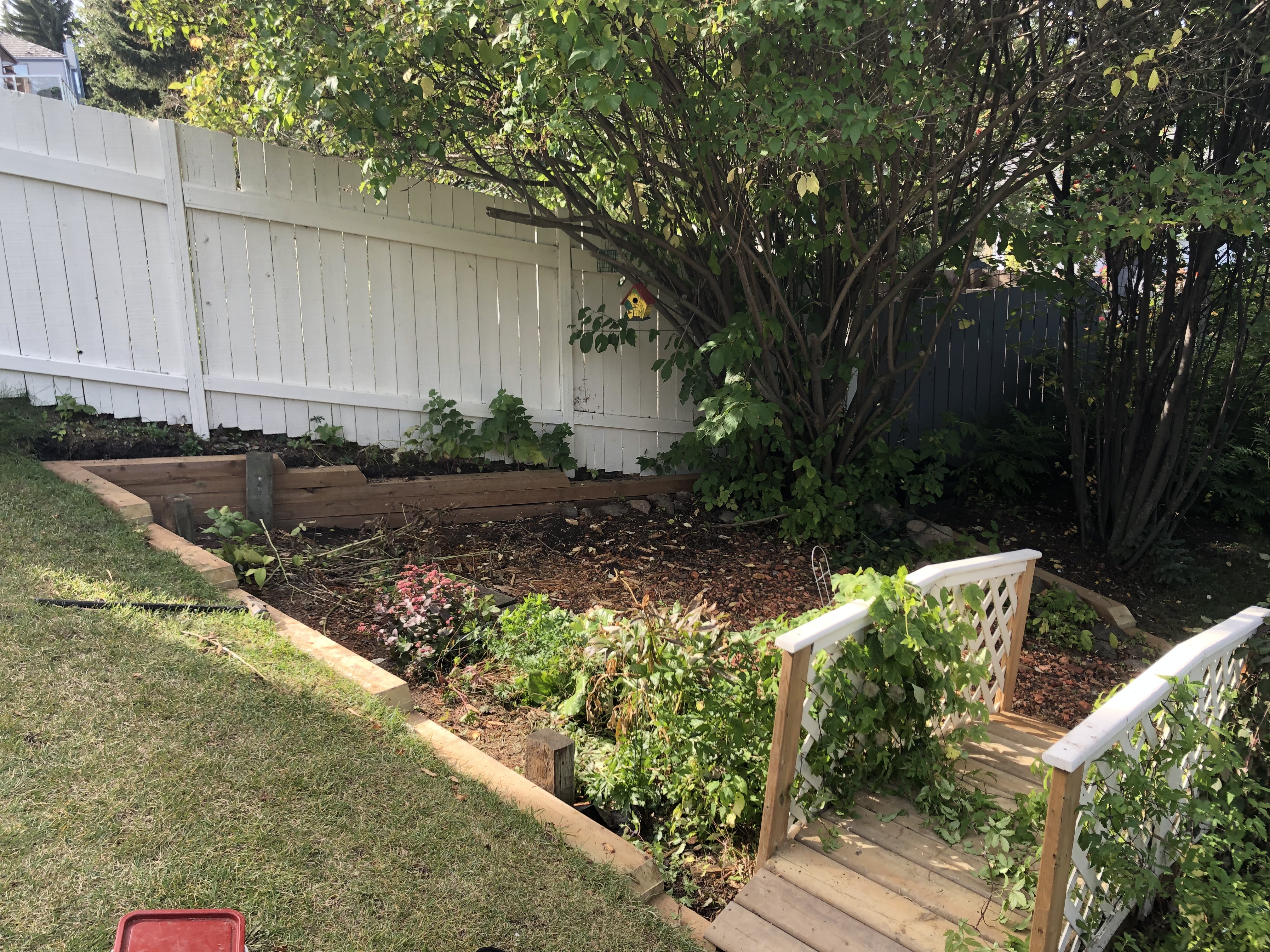 Wood retaining wall and garden box in Edmonton, AB
